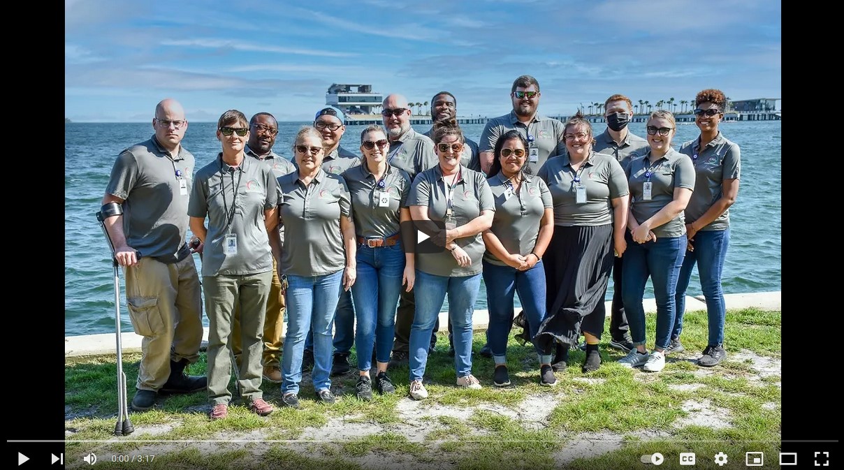 Group picture of all of the CALL workers by the water youtube thumbnail