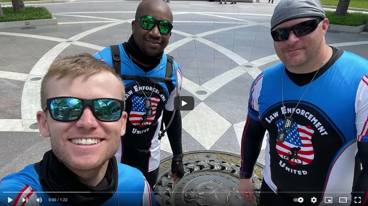 officers smiling at camera in bike gear youtube thumbnail